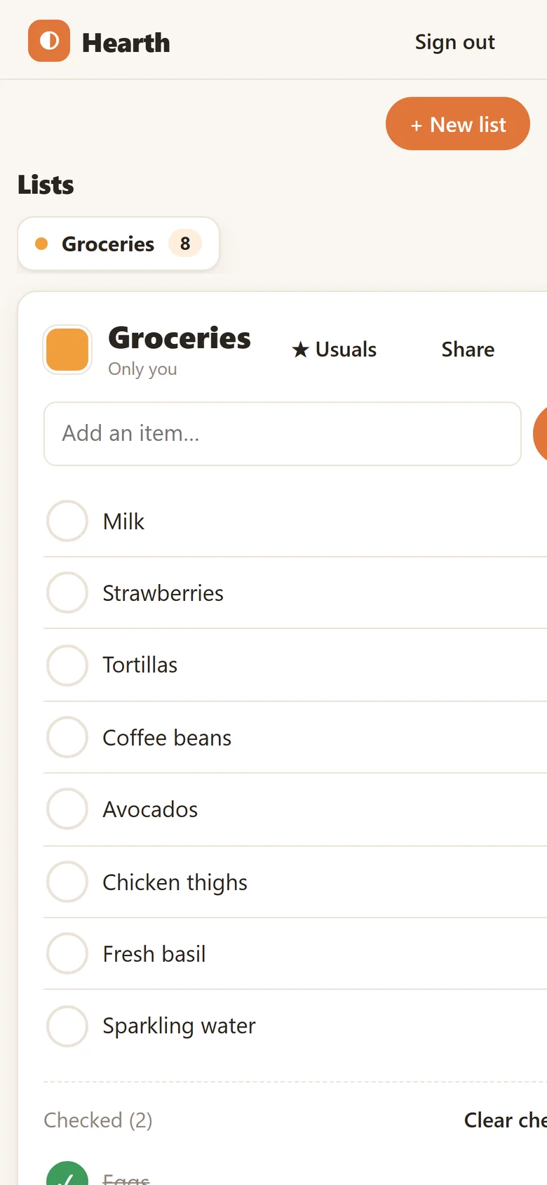 A shared grocery list on a phone, with items to tap off and checked items crossed out.